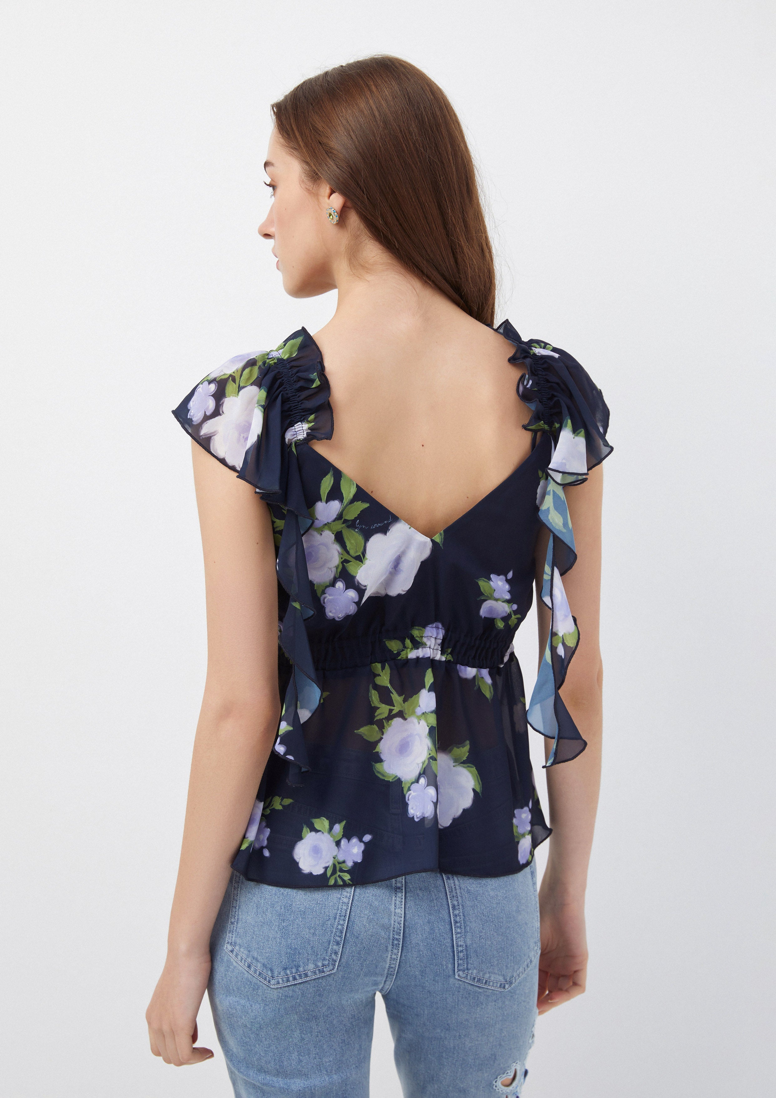 เสื้อเปปลัม ลายดอกไม้ แต่งแขนระบาย Normad Spendor